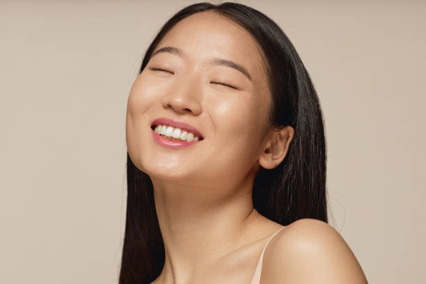 istock Cheerful Asian Girl Smiling Studio Portrait 2134266193