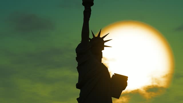 Time-lapse of the Statue of Liberty sculpture in New York, USA under the setting sun