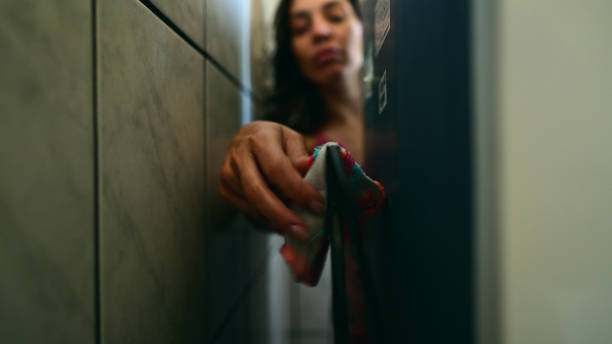 Getting socks from behind the fridge where they were drying