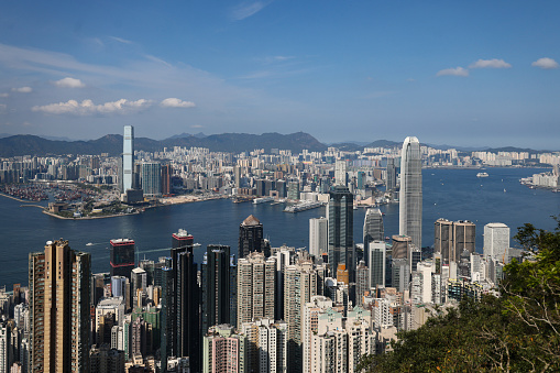 Hong Kong cityscape and Victoria Harbour, viewed from lugard road on the famous Victoria Peak.