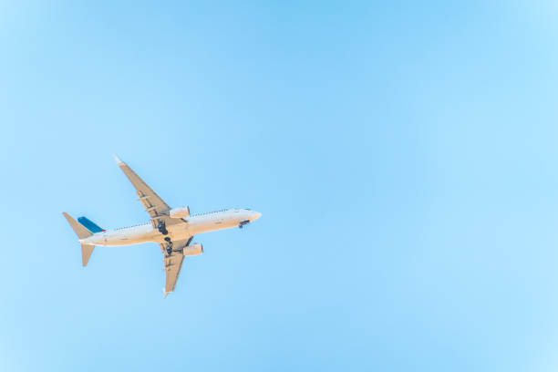 istock Airplane before landing in blue sky, Boeing 737-800 2134437431