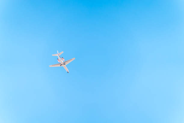 istock Airplane Cessna 680 before landing in blue sky. 2134443712