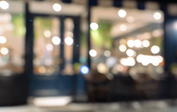 istock Abstract blurred image of cafe or restaurant with bokeh lights background at night 2134456893