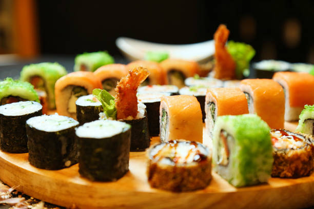 Assorted Sushi Platter on Wooden Plate