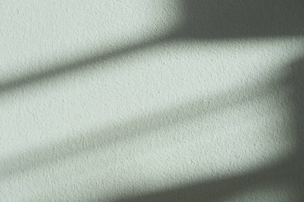 istock Green wall Cement rough texture background,Backdrop Room Display with Shadow Striped diagonal sunlight reflection,Empty Studio background with sunshine effect overlay on concrete floor. 2134600972