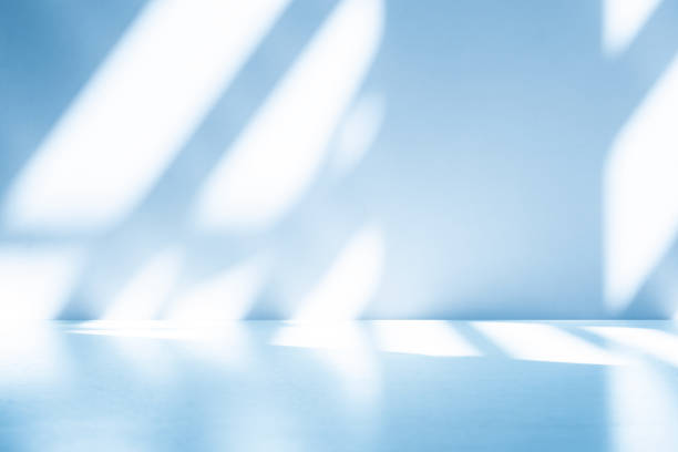 istock Wall interior background, studio, and backdrops show products. with shadow from window color white and blue light. background for text insertion and presentation of product 2134615550