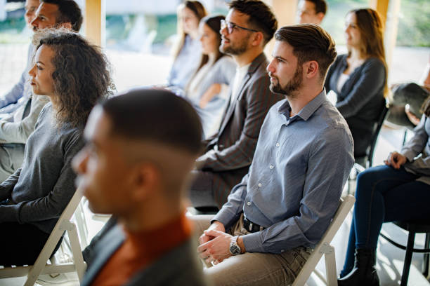 istock Group of entrepreneurs having a seminar in board room. 2134657435