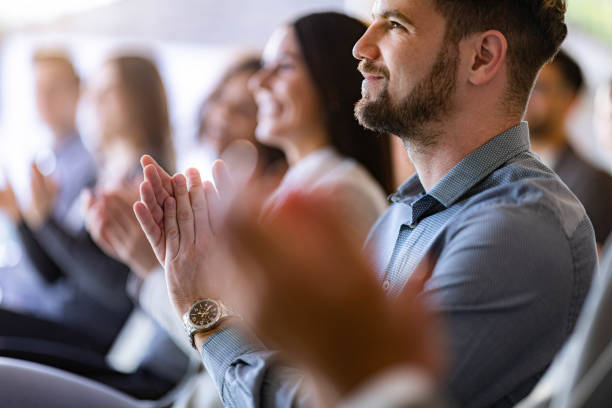 istock Congratulating on successful business seminar! 2134659553