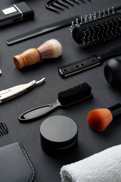 istock Variety of Hair Styling Tools and Accessories Displayed on a Dark Background 2134660097