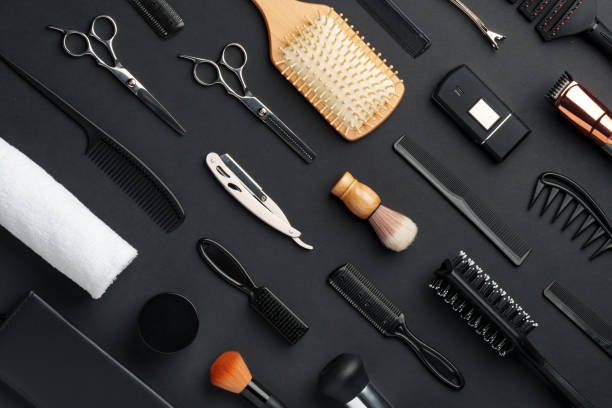 istock Variety of Hair Styling Tools and Accessories Displayed on a Dark Background 2134665864