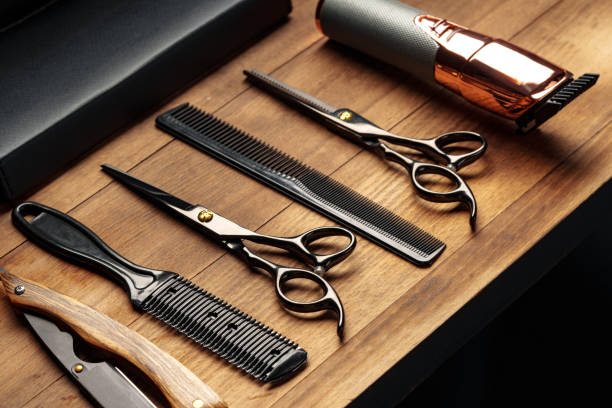 istock Professional Barber Tools Laid Out on Wooden Surface for Mens Grooming Session 2134665885