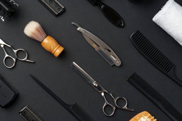 istock Variety of Hair Styling Tools and Accessories Displayed on a Dark Background 2134667443