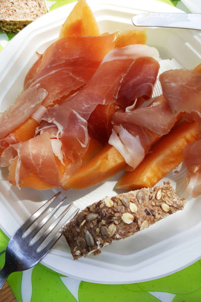 istock Slices of melon with raw ham. 2134670133