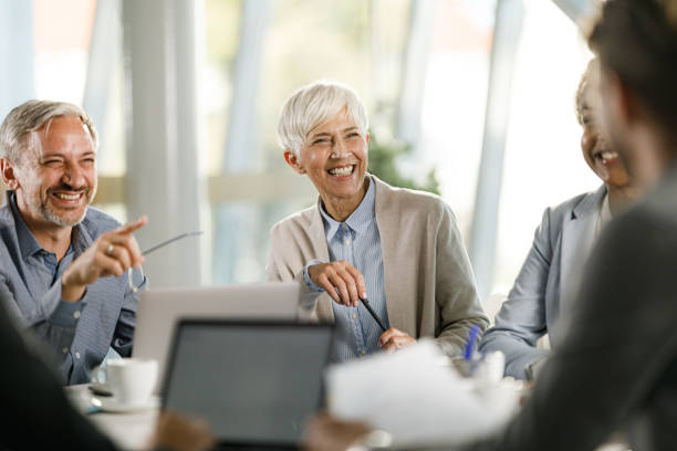 istock Happy business team having a meeting in the office. 2134682904