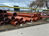 Sewer or water polymer pipes close-up. Water supply system for residential buildings. Laid pipes on a construction site.