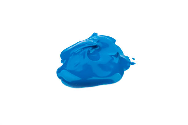 Paint blue spot, isolated on white background.Glossy akril paint.Abstract trace shape. Close up.