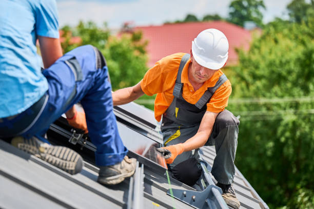 istock Worker looking on evenness of solar modules while building photovoltaic solar system on roof. 2134723076