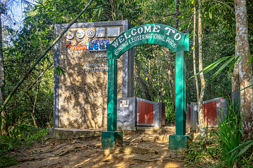 Gunung Leuser National Park, Bukit Lawang, Sumatra, Indonesia - January 20th 2024:  Entrance gate to the national park - there is no fence, the gate is just spot in the jungle