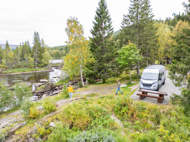 istock Two travelers walking towards a river 2134758529