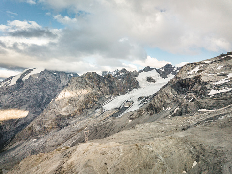 Aerial view of the Alps mountains in Switzerland. View from helicopter in Swiss Alps. Mountain tops in snow. Breathtaking view of Jungfraujoch and the UNESCO World Heritage â the Aletsch Glacier