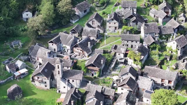 Stone village by Foroglio Waterfall, Tessin, Switzerland - aerial