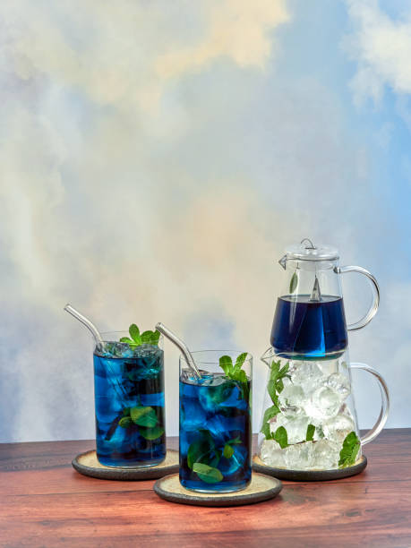 Iced blue tea made from Anchan flowers also known as butterfly pea stock photo