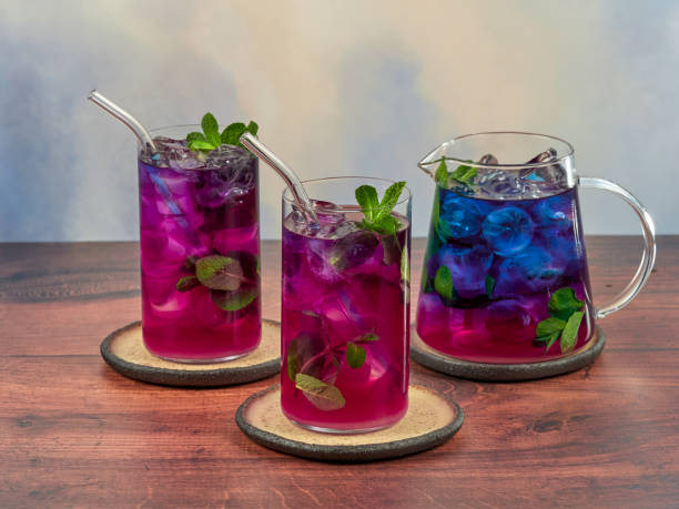 Iced blue tea made from Anchan flowers also known as butterfly pea stock photo
