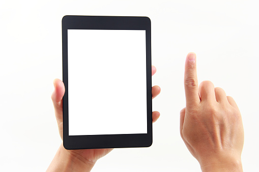 Close-up image of two human hand holding black and white blank screen tablet with hand in touching gesture isolate on white background with clipping path