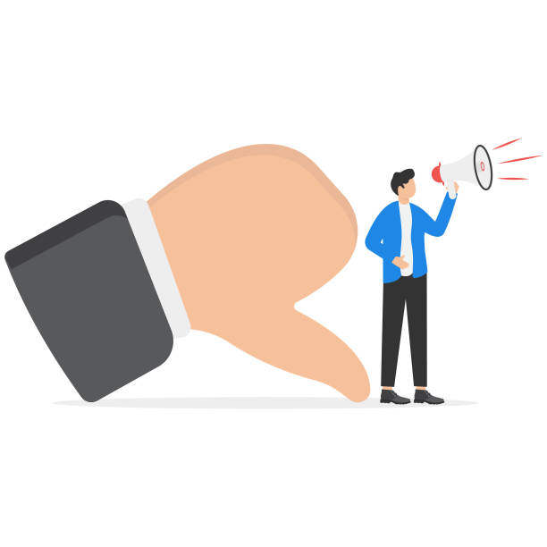 istock Bad businessman with megaphone discredit and blaming other people on thumb down symbol. Bullying, fake news or negative feedback. 2134801248