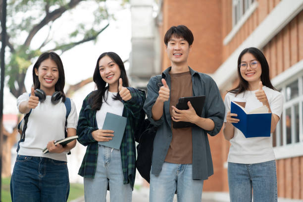 istock Group of students with books preparing for exams during holidays. 2134807595