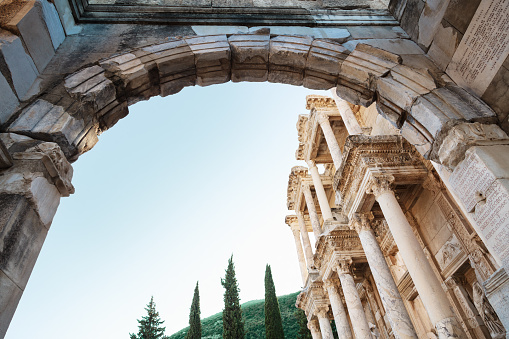 Entrance through the arch of the Library of Celsus in the ancient city of Ephesus, Turkey