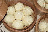 Beef filling pao in bamboo steamer.