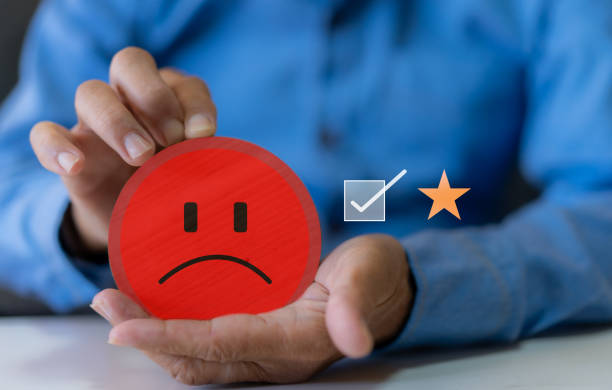 Customer Experience dissatisfied Concept, Unhappy Businessman Client with Sadness Emotion Face on smartphone screen, Bad review, bad service dislike bad quality, low rating, social media not good