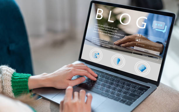 istock Social media online content, freelance worker, working online, content creator, woman using laptop, woman reading blog online on computer at home 2134854334