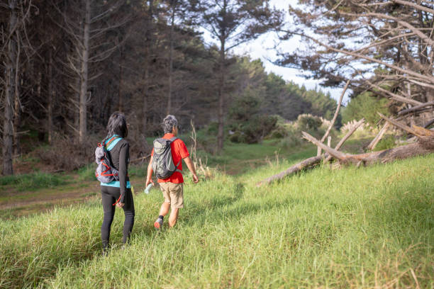 istock Couple Hiking on Trail 2134876030