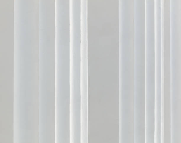 istock White curtain texture for background with copy space for text or image. Walls of the building 2134879744