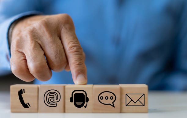istock Human with call center on screen contact us, email, address, operator, customer, suppor, phone services agen, customer support hotline, corporate world and customer care 2134886164