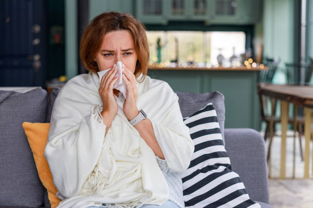 istock Young woman suffering from cold 2134900987