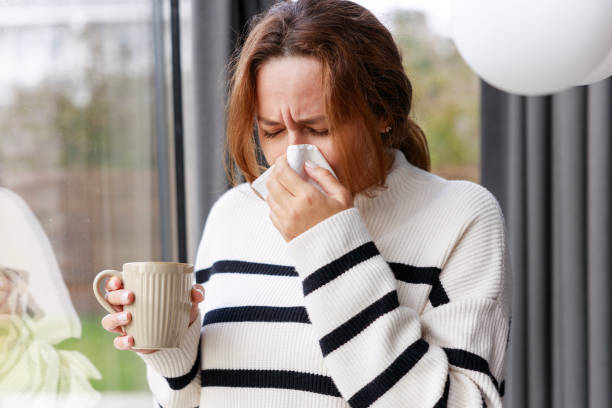 istock Young woman suffering from cold 2134907374