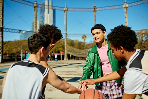 istock Stacked hands among young friends, weekend basketball 2134933647