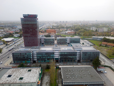 Padua, Italy, 04/02/2024, Aerial view of office buildings in Padua city in a cloudy day
