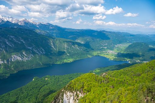 Bohinjsko jezero view from high up the mountains at the Vogel Ski Center in the  Triglav National Park in Slovenia during springtime.