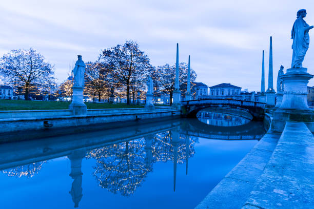 Picturesque scene of Treviso, a charming town near Venice, featuring historic buildings, scenic canals, and quaint streets. The town's architecture reflects its rich history, with colourful facades, arched bridges, and cobblestone pathways creating a captivating atmosphere. Treviso's blend of natural beauty and cultural heritage offers a serene and photogenic setting.