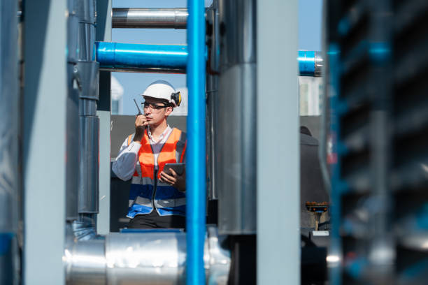 istock Engineers inspect the completed air conditioning and water systems to continue verifying their functionality. 2135001665