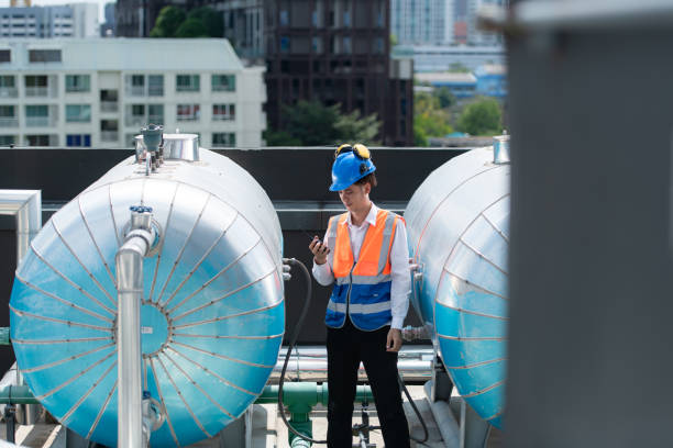 istock Engineers inspect the completed air conditioning and water systems to continue verifying their functionality. 2135004060
