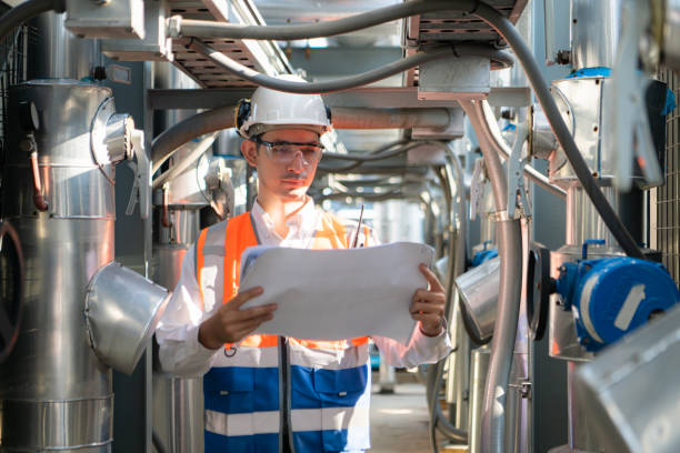 istock Engineers inspect the completed air conditioning and water systems to continue verifying their functionality. 2135005986