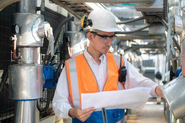 istock Engineers inspect the completed air conditioning and water systems to continue verifying their functionality. 2135005993