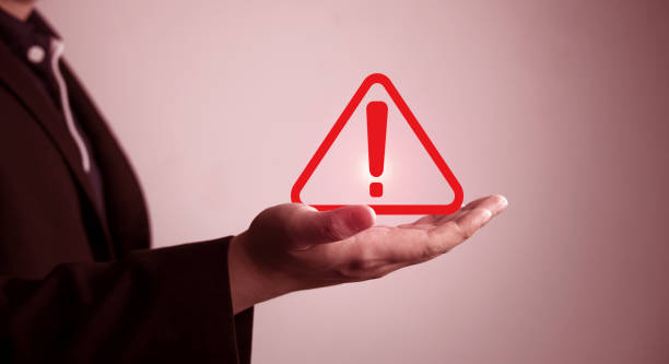 istock Danger and error alert concept. Businessman shows symbol notification warning triangle 2135006003