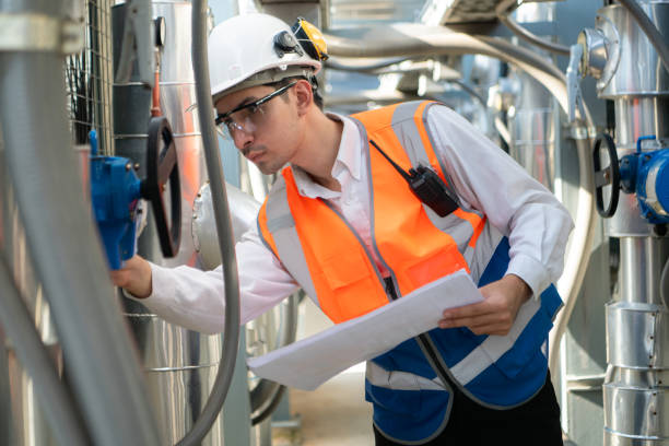 istock Engineers inspect the completed air conditioning and water systems to continue verifying their functionality. 2135006507