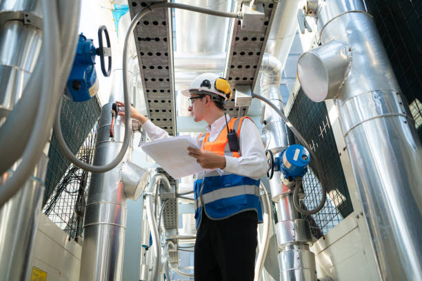 istock Engineers inspect the completed air conditioning and water systems to continue verifying their functionality. 2135006510